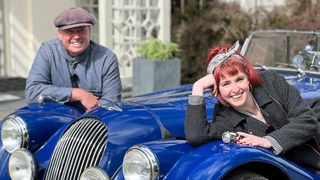 James Picture shows Antiques Experts Braxton and Izzie Balmer next to a classic car.