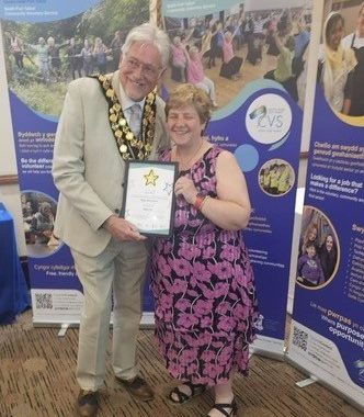 Picture of Anita and the Mayor at the Awards Ceremony. See less