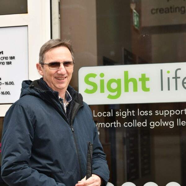 Volunteer and member Andy outside Sight Life
