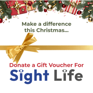 Festive graphic featuring Christmas presents, baubles, greenery and gold ribbons on a white background. Text reads: “Make a difference this Christmas… Donate a Gift Voucher for Sight Life”, encouraging donations to support the charity’s Christmas fundraising raffle.