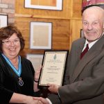 High Sheriff, Janet Davies, presents David Jones with a certificate for outstanding achievement in Volunteering